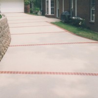Driveway with retaining wall Driveway with retaining wall