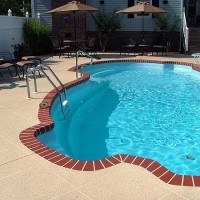 Pool deck brick edge tan coating Pool deck brick edge tan coating
