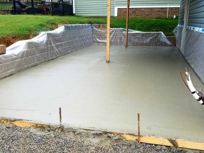 DC-fresh-pour-patio-w-retainwall-2